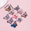 Colgante Cruzado Floral Mariposa Aceite Goteado Accesorios Impresos Coloridos Pendientes DIY Llavero Adorno Accesorios Venta al por Mayor