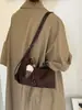 Bolso de mano informal transfronterizo, bolso de hombro, bolso cruzado, nuevo estilo vintage otoño 2026, gran capacidad, elegante, para el trabajo, tipo bolsa de albóndiga