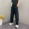 Pantalones casuales de color marrón melange de tiro alto para hombre, estilo callejero americano, adecuados para primavera y otoño, con un diseño ligeramente acampanado y pierna recta.