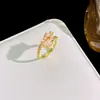 Mesmo estilo do Xiaohongshu: anel de cobra de cabeça dupla, moderno e elegante, popular entre influenciadores, anel aberto ajustável, cobre com cravação de zircônia cúbica, joias para atacado