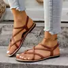 Sandalias planas tejidas de chanclas de comercio exterior europeo y americano para playa 2026 nuevas casuales transfronterizas talla grande sin cordones para mujer