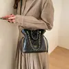 Bolso de Cadena a Cuadros de Alta Apariencia de Nicho 2026 Primavera Nuevo Bolso de Hombro de Moda Gran Capacidad Bolso Cubo para Viajes Diarios