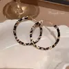 Pendientes de anillo liso exagerado con aguja de plata S925 de estilo europeo y americano para mujer, pendientes de temperamento simple Joker de lujo ligero de alta gama, venta al por mayor
