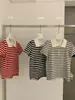 Wgwe9185 Guangzhou Shisanxing Nuevo Top de Punto para Mujer de Verano con Cuello Polo Rayado Bloque de Color Manga Corta Moderno