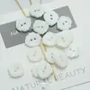 Botão de resina branco para vestido de camisa, casaco, sobretudo, botão decorativo em formato de folha com dois furos