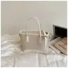 Bolso pequeño con patrón tejido transfronterizo para mujer, diseño nuevo, elegante y moderno, bolso tipo cubo, alto valor estético, adecuado para ir al trabajo, bolso de hombro y cruzado