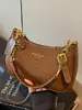 Bolso de nicho para mujer muy elegante 2026 nueva moda bandolera individual para el hombro y el antebrazo para mujer, bolso cuadrado pequeño con cadena para commuters