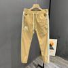 Calças Casuais Masculinas de Outono Transfronteiriças Tendência Versátil Slim-fit Calças Esportivas para Pés Calças de Costura da Moda