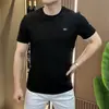 2026 Nova Camiseta Masculina de Manga Curta com Gola Redonda Tendência Cor Sólida Texturizada Meia Manga Moda Versátil Camiseta Tendência