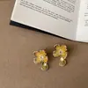 Pendientes de Flor de Metal con Textura de Lujo Ligero para Mujer Diseño de Nicho Exquisitos Versátiles para el Trabajo Pendientes Pendientes