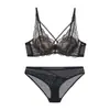 Popular conjunto de lencería de encaje francés para mujer, con aros, diseño push-up, espalda sexy cruzada y conjunto a juego de sujetador y braguita.