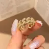 Anillo de Perla de Doble Capa con Circonita de Estrella de Cinco Puntas Estilo Coreano Nicho Sensación de Alta Gama Índice de Lujo Ligero Anillo de Dedo Diseño Personalizado Joyería Versátil para Mano