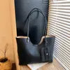 Bolso de mujer de gran capacidad, nuevo modelo primavera-verano 2026, de alta gama, bolso de hombro simple y versátil para el trabajo y los desplazamientos, bolso tote