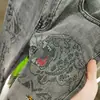 Jeans Europeos para Hombre de Primavera y Otoño Marca de Moda Cabeza de Tigre Pedrería Personalizados Corte Delgado Moda Retro Elásticos