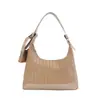 Popular bolso de hombro de cadena tejida para dumplings de alta gama 2026 nuevo elegante tendencia de moda para el trabajo bandolera para mujer