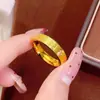 Anel da Sorte Dourado CNC para Homens e Mulheres, Novo Anel de Cabacinha com Caractere da Sorte Estilo Chinês, Joias de Alto Padrão Estilo Nacional Atacado