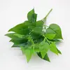 Atacado de fábrica planta de simulação planta verde falsa folha de plástico flor artificial planta parede material ramo perene de flores artificiais