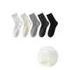 Calcetines Zhuji al por mayor 7A Algodón Puro Calcetines para Mujer Cuatro Estaciones Media Pantorrilla Blancos Estudiante Color Sólido Calcetines Largos Apilables