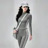 Conjunto de roupa de yoga para uso diário feminino: cardigã curto acinturado com listras laterais e calça flare de alta elasticidade para fitness, conjunto de duas peças