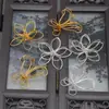 Material para joyería DIY cobre enrollado Flor hueca tridimensional Corona de fénix Xiuhe material para tocado
