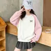 Novedades transfronterizas otoño e invierno sudaderas para niños medianos y grandes tops básicos de manga larga para niñas con estampado de lazo degradado europeo y americano