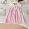Vestido de Verano para Niñas 2026 Nuevo Estilo Solapa Grande Sin Mangas Lazo Vestido Chaleco Estilo Universitario Casual Vestido Infantil