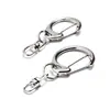 Chaveiros de Liga de Zinco para Joias Transfronteiriças 42 Chaveiros de Figuras Pequenas e Médias Vários Chaveiros Pendentes de Bonecas de Brinquedo