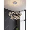 NEIWAI, un lujoso candelabro de cristal con intrincados diseños florales, perfecto para salas de estar, villas y salones principales, con un sofisticado diseño de anillo redondo y un marco metálico
