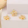 Material al por mayor para accesorios de joyería semiterminados metal con incrustaciones de circonita colgante de flor diy collar pulsera aretes colgante