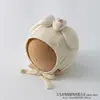 Nuevo Sombrero Protector de Orejas con Lazo 2026 Sombrero para Bebé Estilo Nuevo Primavera y Otoño Sombrero Protector de Orejas de Suéter para Niños y Niñas