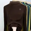 Camiseta de punto con cuello semitortuga para mujer en Otoño e Invierno, Estilo Nicho Dibujos Animados Blanca Cálida Capa Interior Efecto Adelgazante Camiseta Básica