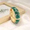 Bestseller transfronteiriço na Europa e América: Pulseira de design irregular em blocos de cores esmaltadas retrô criativas com design de bambu ondulado boêmio