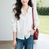Camisa con Solapa Bordada Hueca para Mujer Manga Larga 2026 Principios de Otoño Nuevo Estilo Temperamento Commute Simple Suelta Adelgazante