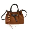 Bolso cubo retro de ante para mujer, nueva colección otoño 2026, versátil bolso de hombro, bolso de mano, bolso cruzado, simple y elegante para el trabajo