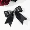 Horquilla con lazo y letras vintage negras para mujer, estilo oscuro, dulce y moderno, estilo de alta gama, con clip lateral y clip superior, accesorios para el cabello