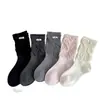 Calcetines de estilo ballet otoño/invierno estilo ins coreano puño suelto borde enrollado longitud hasta media pantorrilla adelgazantes tela de felpa JK etiqueta de tela estilo academia de huevo calcetines largos