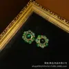 Brincos de metal antigo banhado a cobre 18K estilo retrô antigo estilo chinês novo com contas redondas verdes requintados discretos nobres