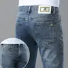 Calça jeans de seda gelada italiana para homens, nova de outono, corte slim, stretch, lyocell de alta qualidade, calça casual azul claro