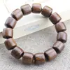 Venta al por mayor de fábrica pulsera de sándalo de seda dorada cuentas de barril de personalidad 15 mm cuentas de Buda de madera joyería para hombres y mujeres transmisión en vivo bienestar