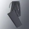 Pantalones de verano transpirables de secado rápido para hombre de talla grande, pantalones elásticos de seda helada, frescos y transpirables, elásticos, holgados y casuales para exportación