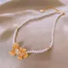 Colar de borla de pérola com formato de coração estilo coreano, moda de nicho com toque de luxo, corrente versátil para a clavícula, atacado