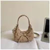 Exquisito bolso de lunares de nicho para mujer, nuevo bolso cruzado versátil de moda 2026, bolso de mano elegante de alta gama