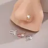 Moda Europea y Americana Transfronteriza Personalidad Versátil Temperamento Joyería para la Nariz Pinza para la Nariz Sin Perforación Flor Zirconia Microincrustada Aro para la Nariz Venta al por Mayor