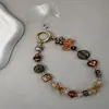 Sino de Vento Exótico Orquídea Corrente de Celular Ins Moda de Alto Padrão Pingente de Pulso Feminino Capa de Celular Corrente Pendente de Contas