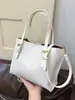 Bolso Pequeño Transfronterizo para Mujer 2026 Nuevo Diseño Retro de Nicho Bolso de Mano Tipo Cubo Bolso de Hombro Cruzado Tejido a la Moda