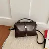 Riñonera minimalista de moda transfronteriza, nuevo estilo coreano de piel sintética, moderna y refinada, diseño casual, cruzada o de mano, bolso cuadrado pequeño