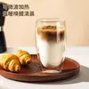 Copo térmico de vidro transparente em formato de ovo com dupla camada, ideal para leite, café, suco e outras bebidas. Feito em vidro borossilicato de alta qualidade.