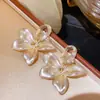 Pendientes Redondos Plegados con Borlas Tachonados de Pedrería Estilo Retro Europeo y Americano, de Moda y Versátiles, con un Toque de Lujo Ligero y de Alta Gama