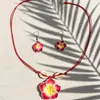 Colar e Brinco de Corda de Cera Flor de Ovo Fresca e Simples Conjuntos Atacado de Conjuntos de Colares de Flor de Argila Macia Europeus e Americanos Transfronteiriços