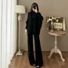 Conjunto casual de duas peças em estilo descontraído, nova coleção outono e inverno, apresentando um top de tricô com manga morcego irregular e calça pantalona.